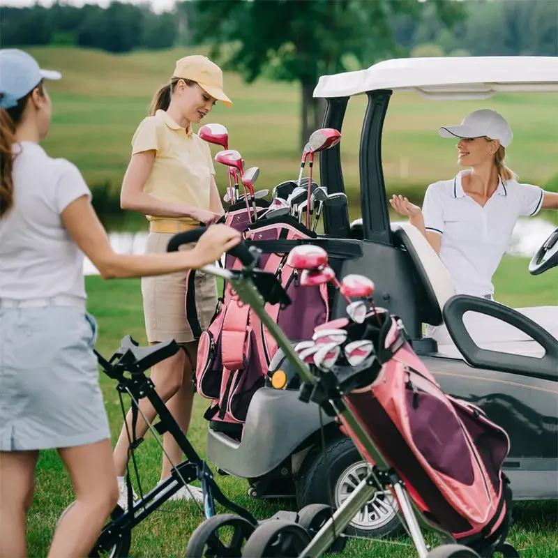 Services 1 Women golfers and a golf cart